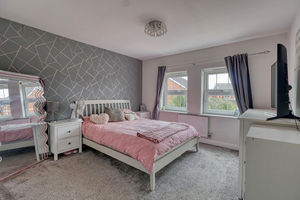 Bedroom One- click for photo gallery